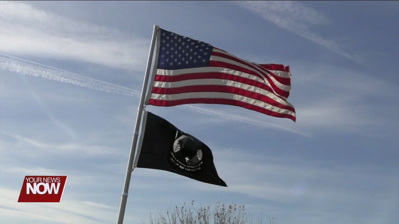 Chained Eagles of Ohio replaces MIA-POW sign and puts up flagpole on Conant Road
